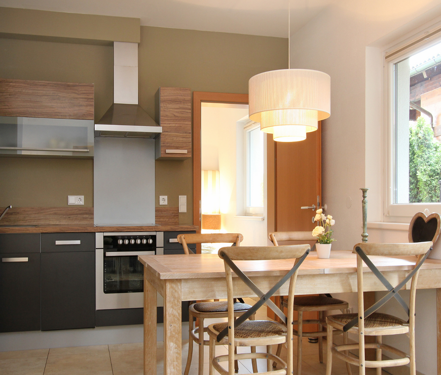 Avenida Style Appartements Kaprun: Küche und Esstisch