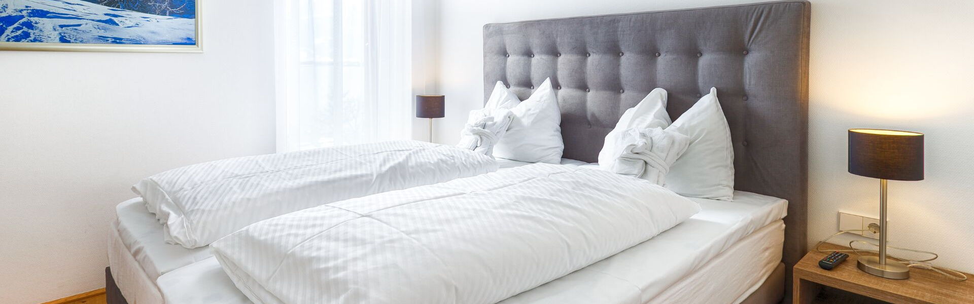 Residence Bellevue Zell am See: Schlafzimmer mit Doppelbett