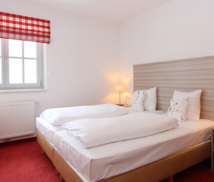 Alpine Resort Kaprun: Schlafzimmer mit Doppelbett